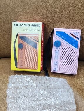 26 International Pink AM Pocket Radio with Blue Dial